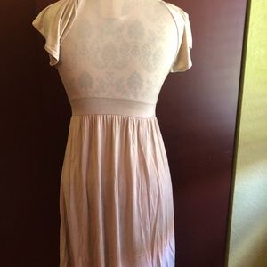 Beige dress with beaded embellishments